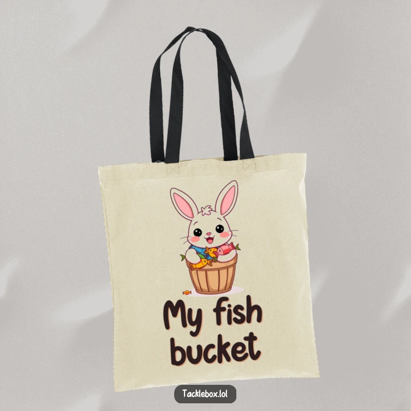 Funny tote bag showing a cheerful bunny beaming proudly with a bucket overflowing with colorful fish.
